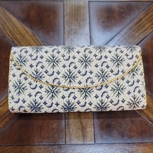 Elegant Floral Clutch with Gold Accents